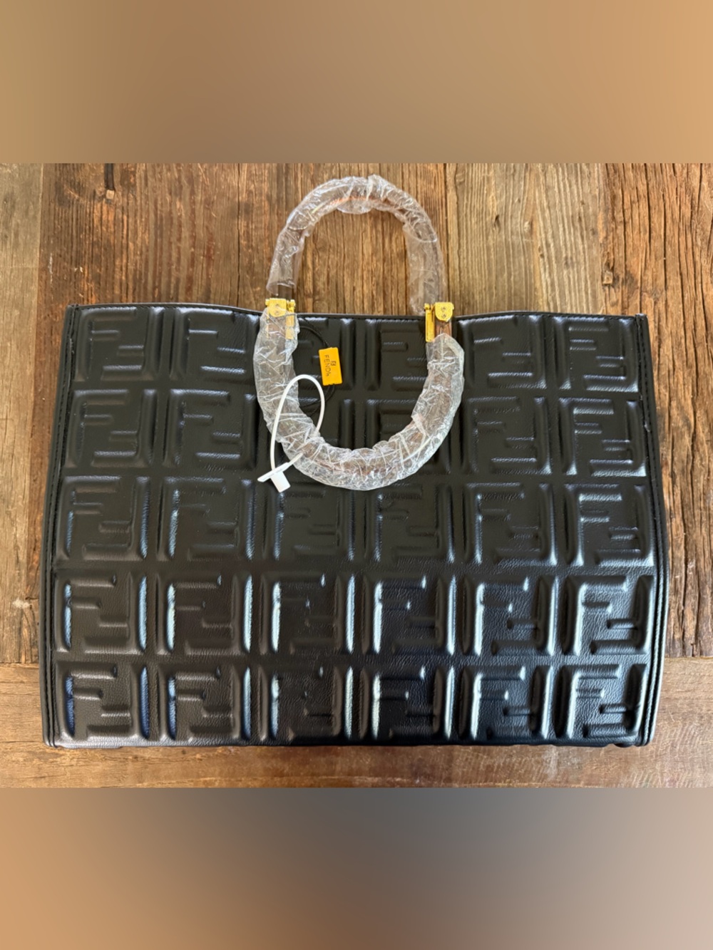 Black Quilted Tote Handbag with Gold Accents